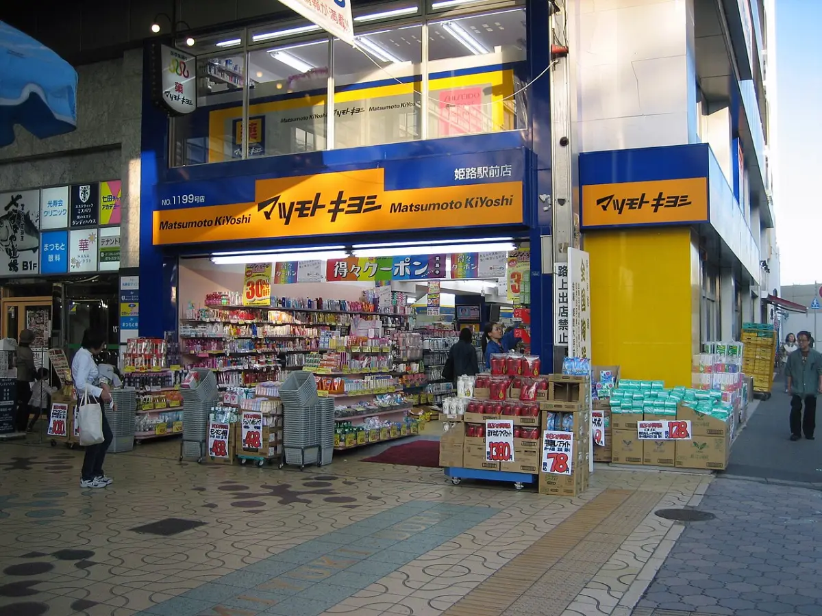 Matsumoto Kiyoshi drugstore front in Japan with shelves of everyday medicines and toiletries