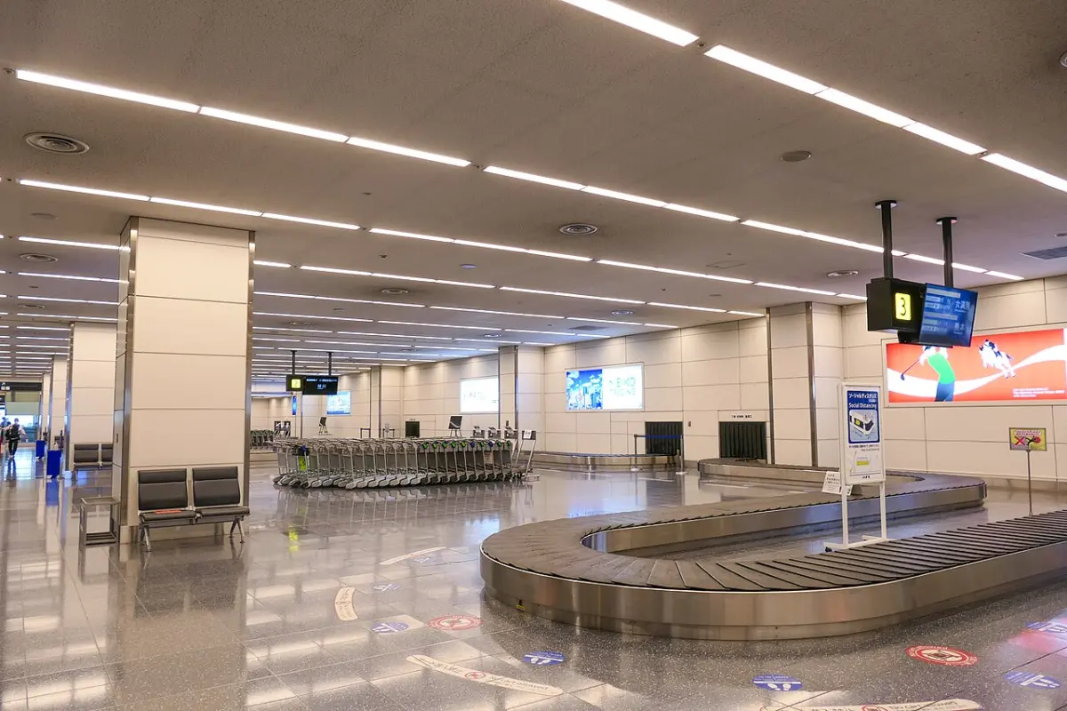 Bright, quiet baggage claim hall at Haneda Airport Terminal 2 in Tokyo