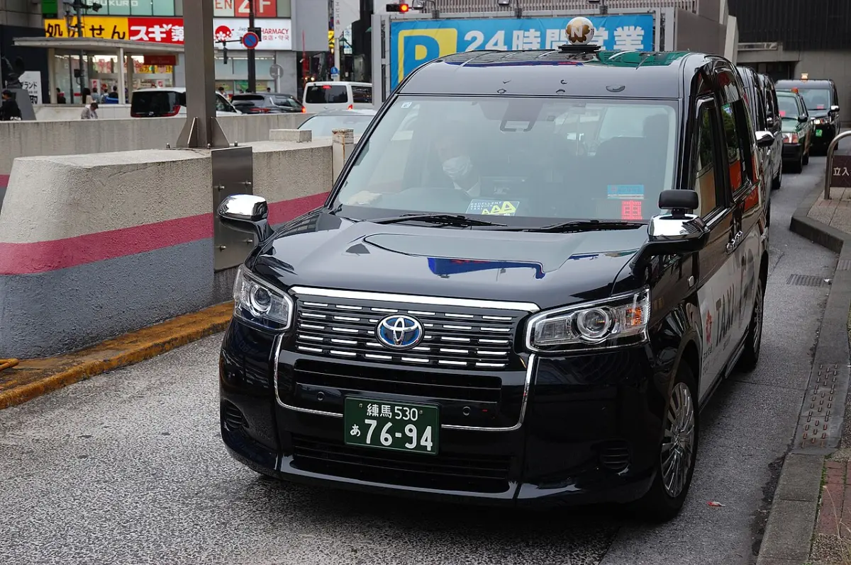 Black Toyota JPN Taxi at the taxi stand outside Ikebukuro Station, Tokyo