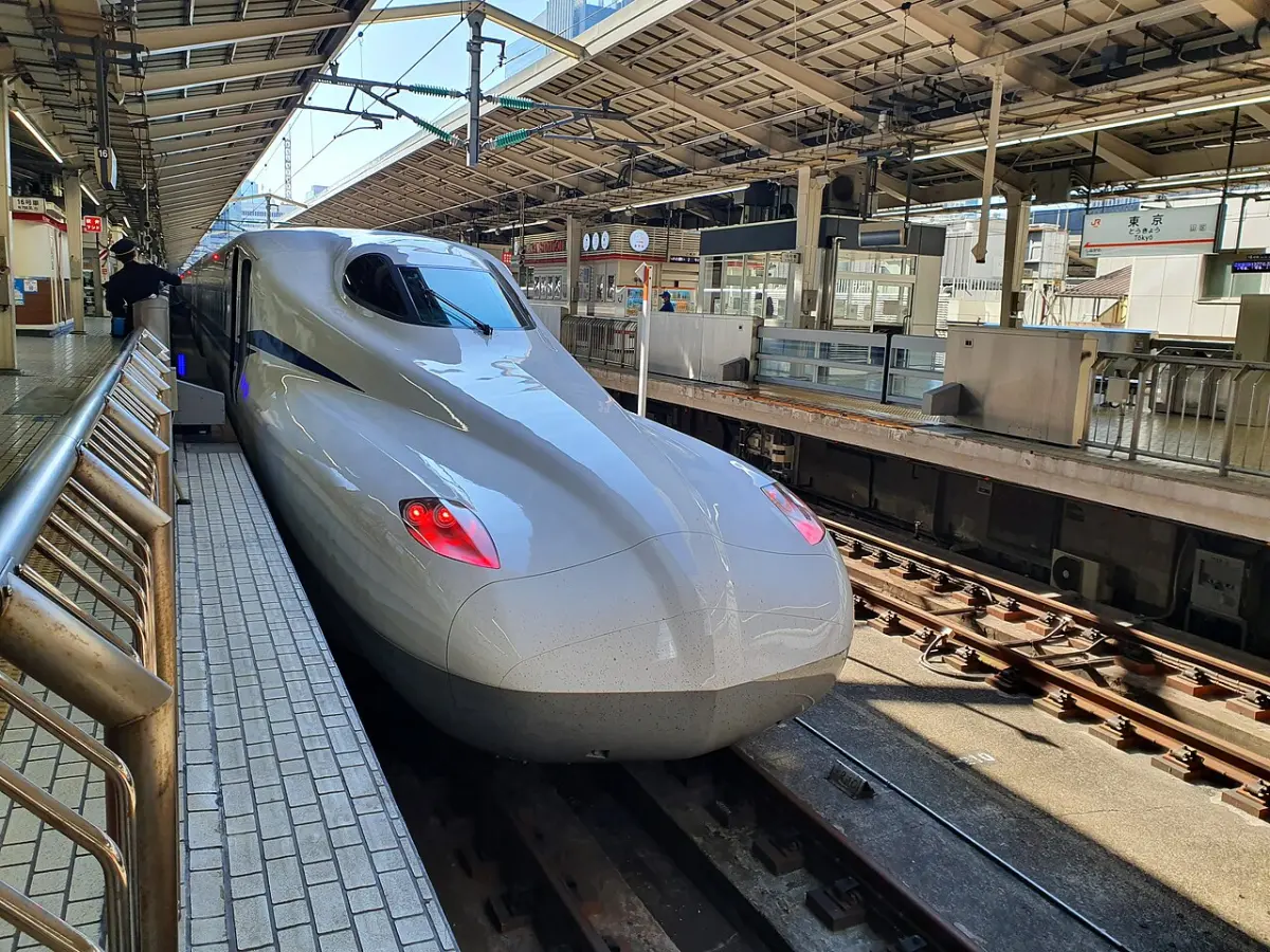 N700S series Shinkansen bullet train stopped at a platform in Tokyo Station