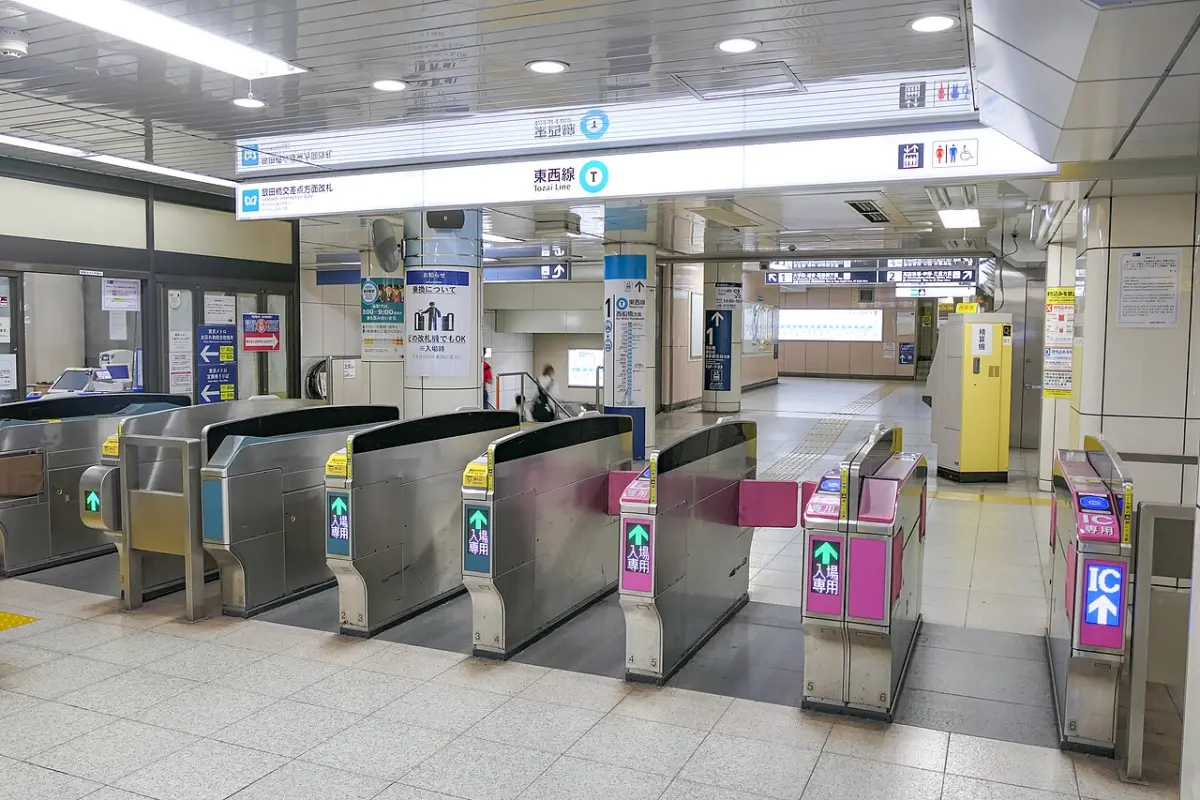 Tokyo Metro ticket gates at Iidabashi Station with IC card readers