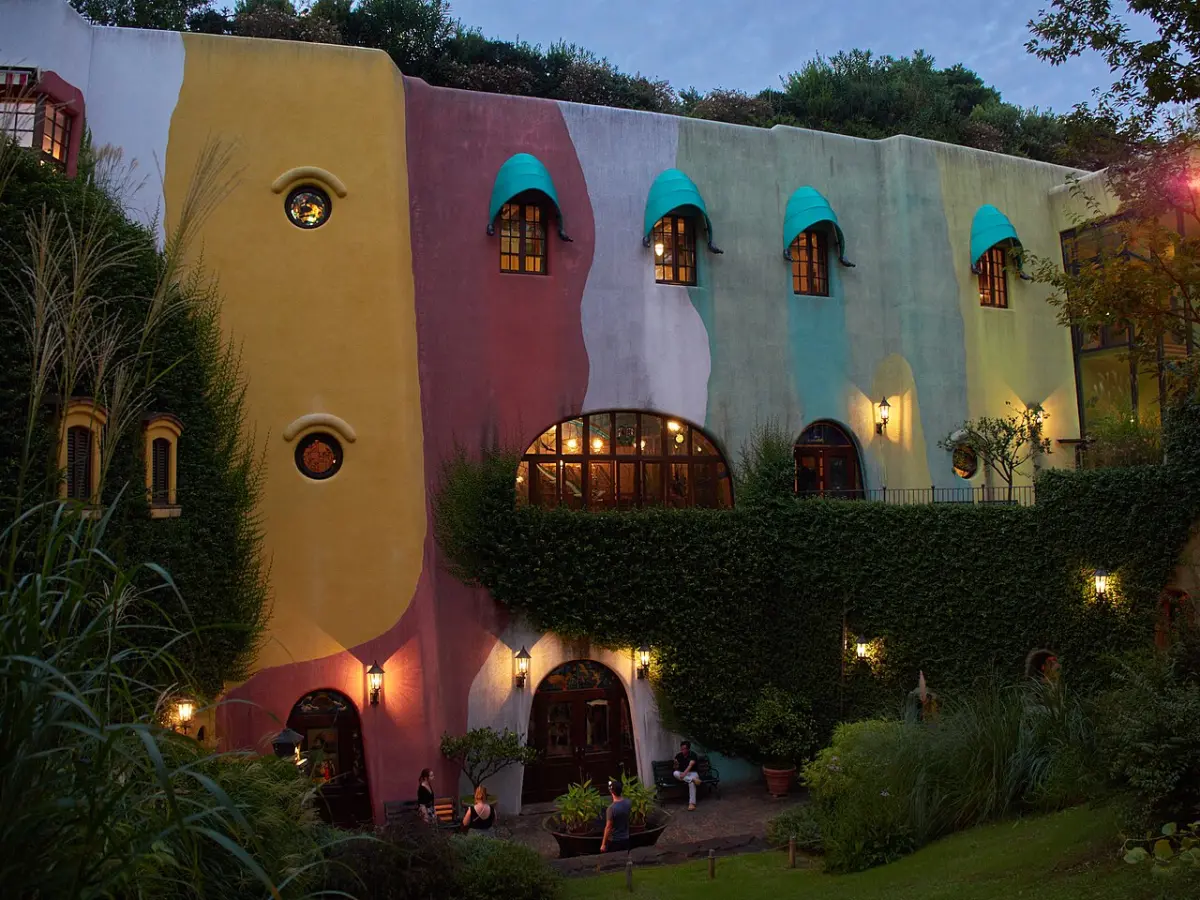 Colorful exterior walls of the Ghibli Museum in Mitaka at dusk
