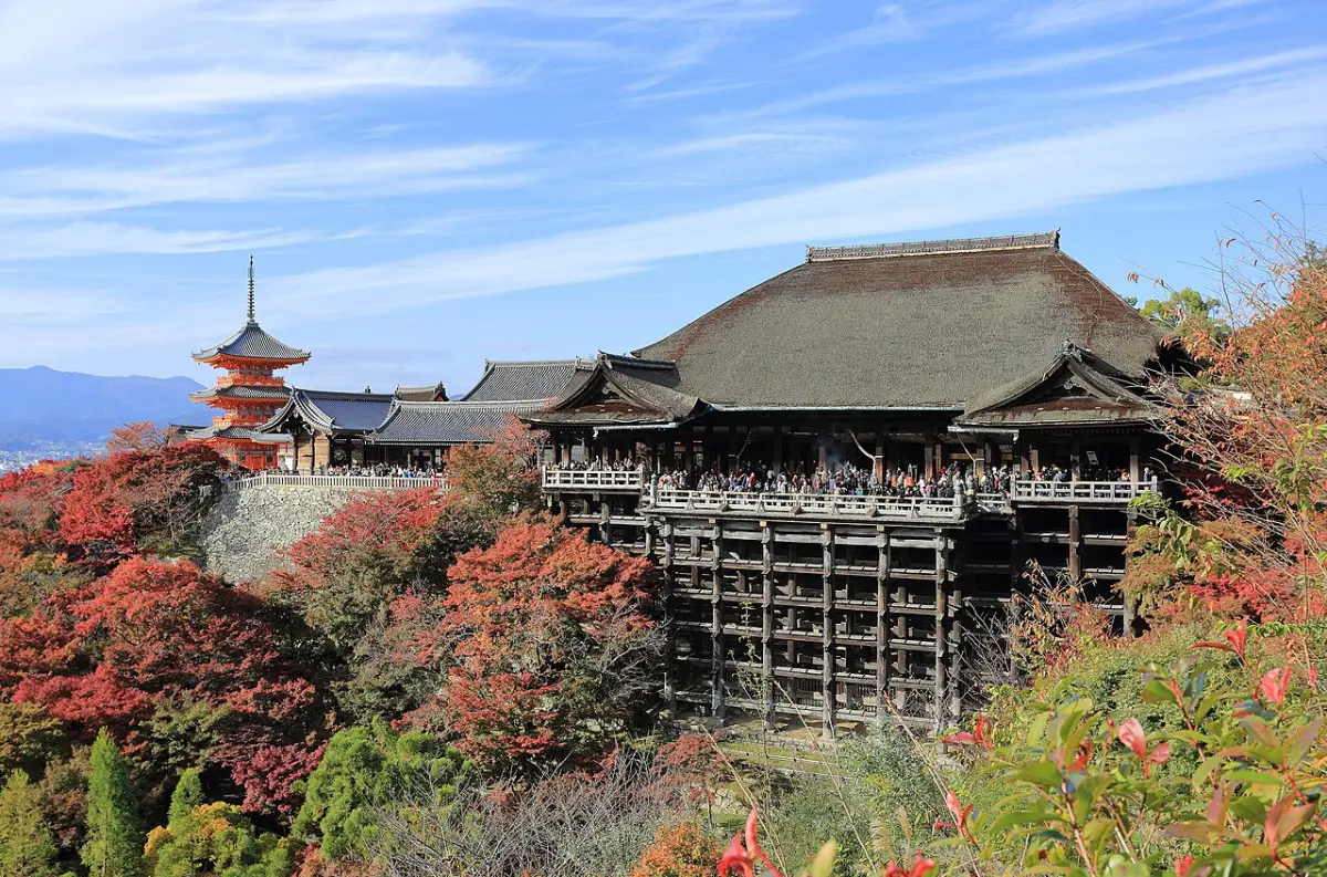Kiyomizu-dera Temple in Kyoto surrounded by red autumn maples in November