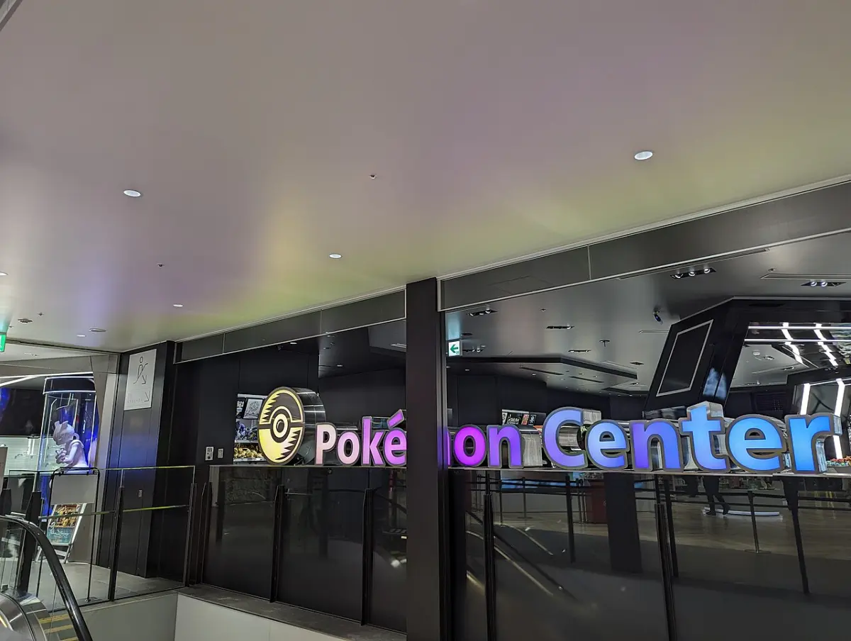 Illuminated Pokémon Center store sign at Shibuya PARCO in Tokyo